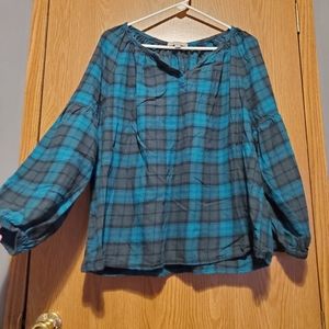 Long sleeve emerald green plaid shirt.